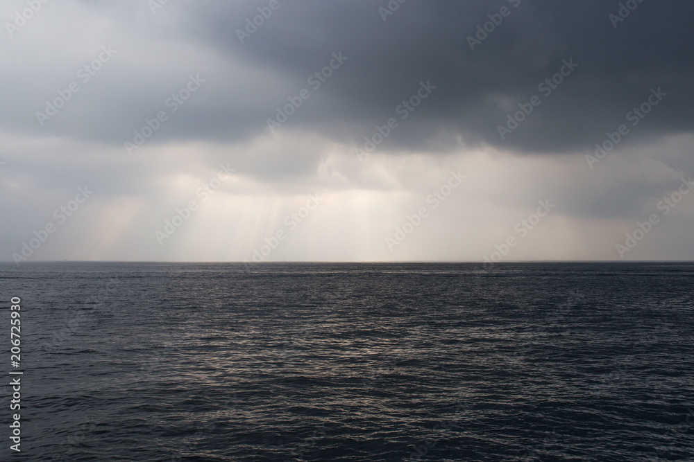 Image of  storm clouds and sea.