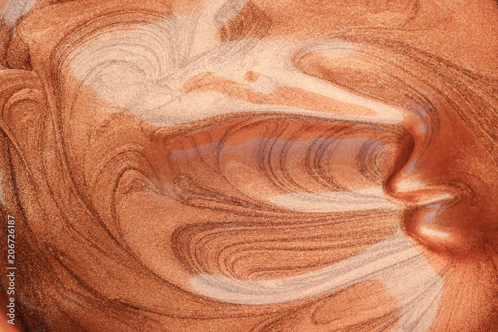 Obraz premium brown orange pearl paint cosmetics texture background