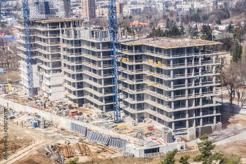 tower cranes against the bl...