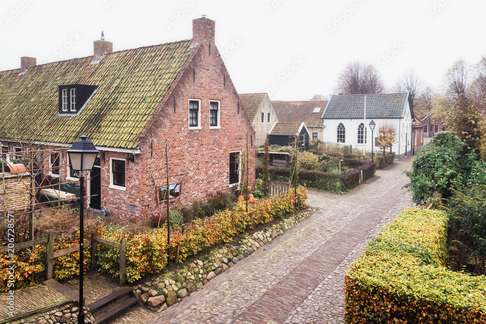 The small houses in Bourtange, a Dutch fortified village in the province of Groningen The small houses in Bourtange, a Dutch fortified village in the province of Groningen