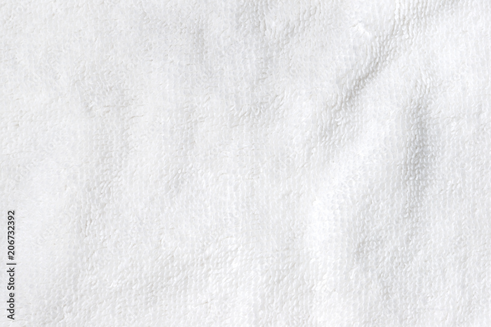 soft white texture of bath towel folded like background