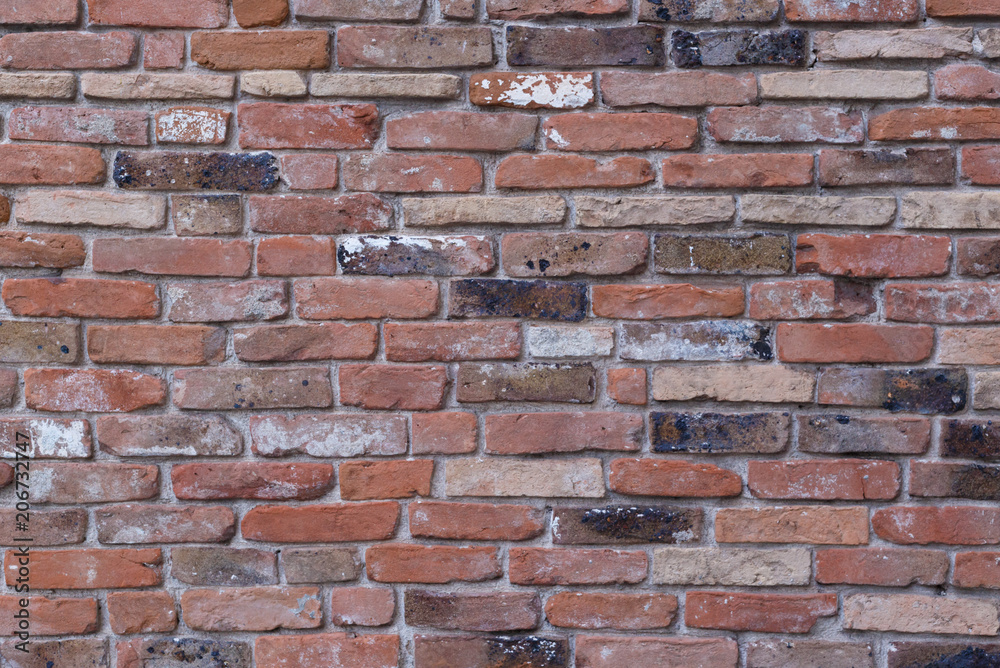 Obraz premium red brick wall texture grunge background, closeup