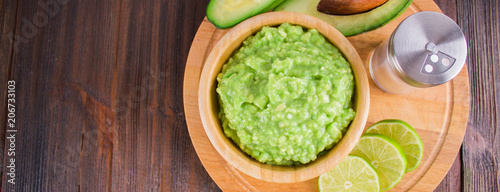 avocado Guacamole on molcajete real Mexican traditional procedur photo