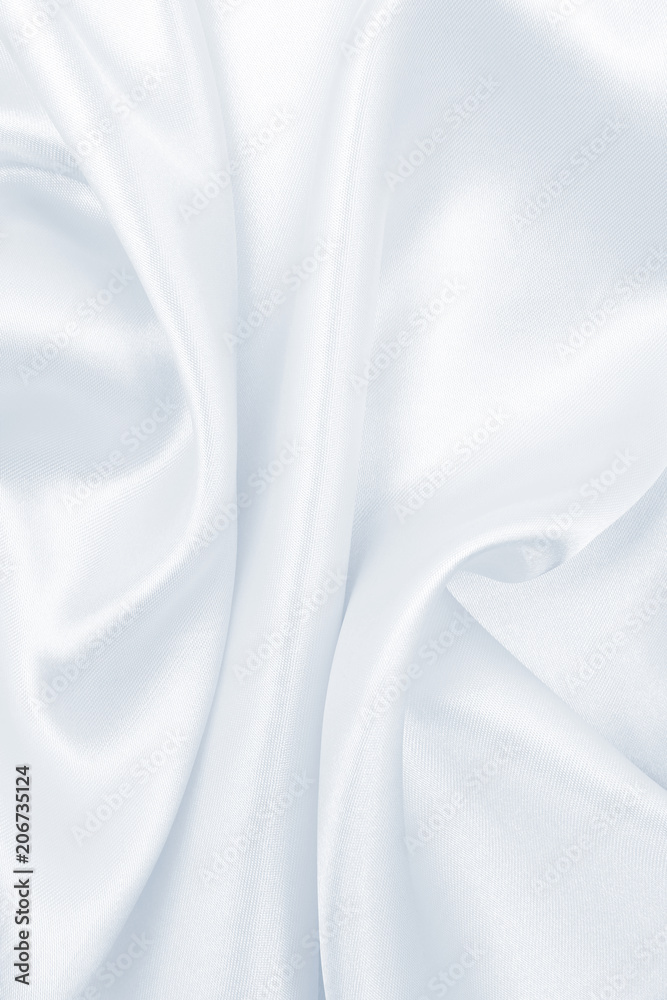 Smooth elegant grey silk or satin luxury cloth as wedding background. Luxurious Christmas background or New Year background design Smooth elegant grey silk or satin luxury cloth as wedding background. Luxurious Christmas background or New Year background design