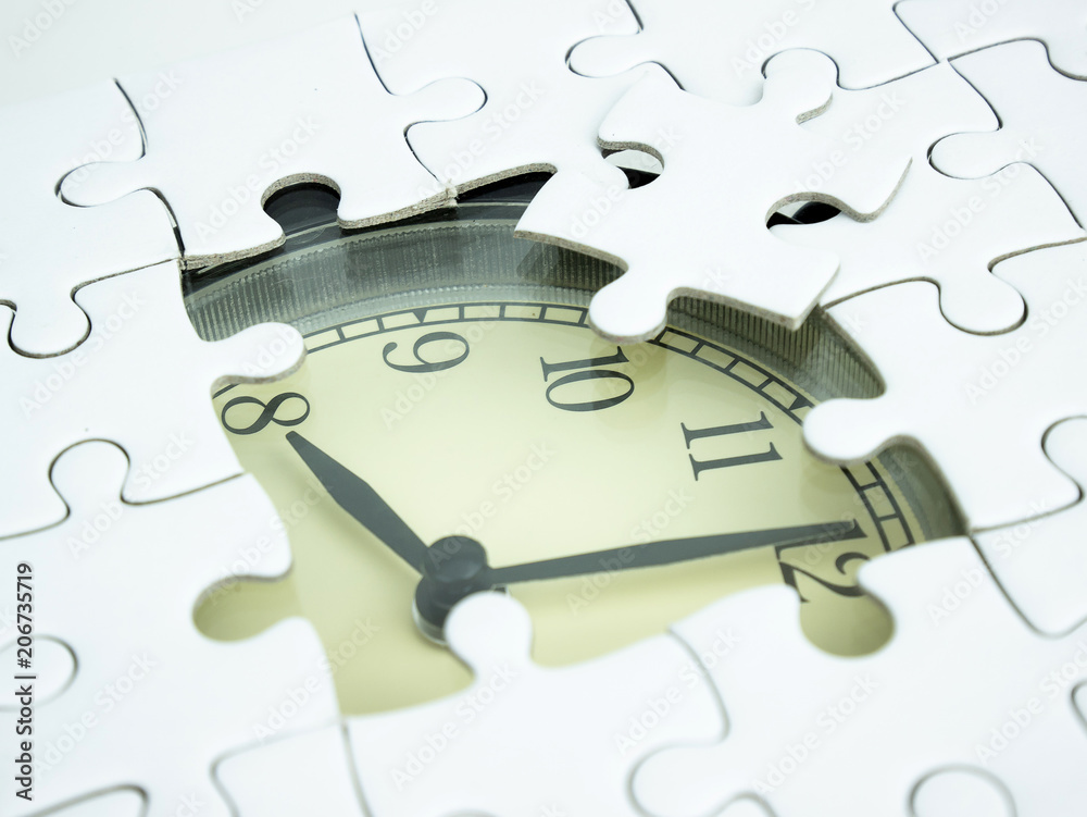 Missing jigsaw puzzle pieces on Alarm clock background, Business solution  concept, Time for success concept Stock Photo | Adobe Stock