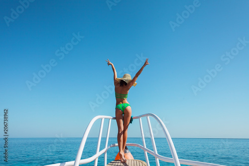 happy girl on yacht going to paradise