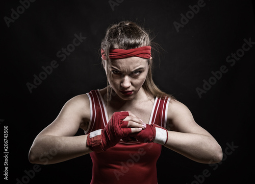 Female kickboxer training in gym, boxing workout © Nomad_Soul