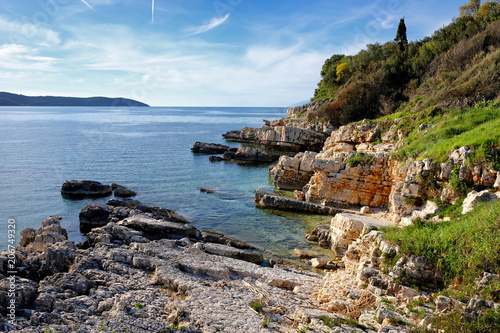 The rocky Bataria beach at Kassiopi with in Corfu  Greece
