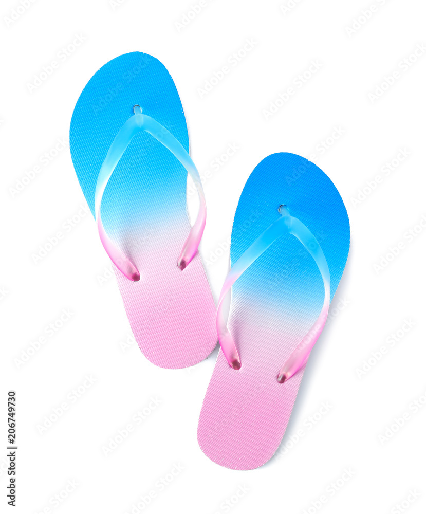 Bright flip flops on white background. Beach object