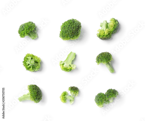 Flat lay composition with fresh green broccoli on light background
