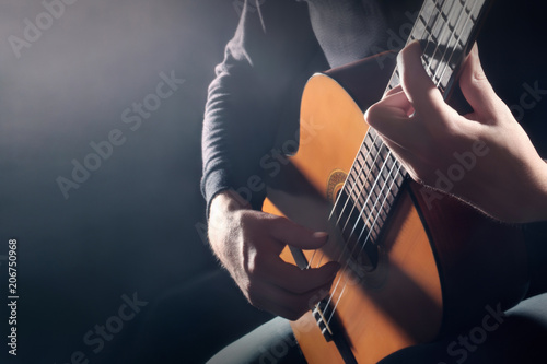 Acoustic guitar player. Classical guitarist hands