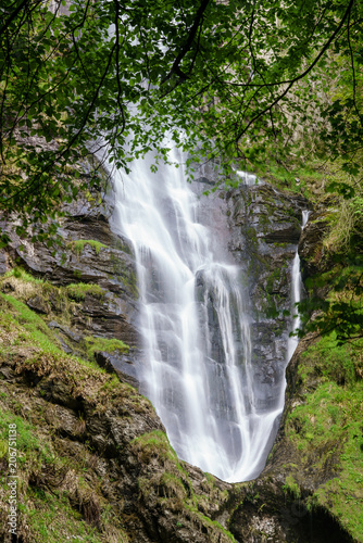 Water falling into midway pool at waterfall of Pistyll Rhaeadr in Wales photo