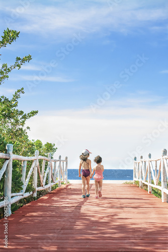 Sisters going to the beach