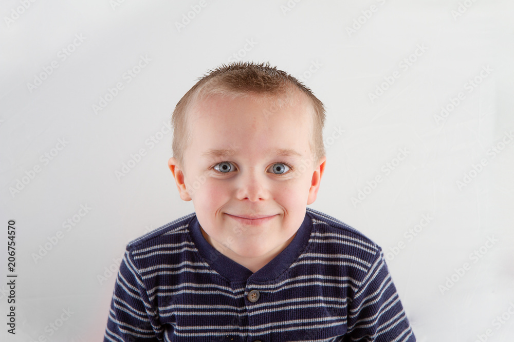 young boy smiles young boy smiles