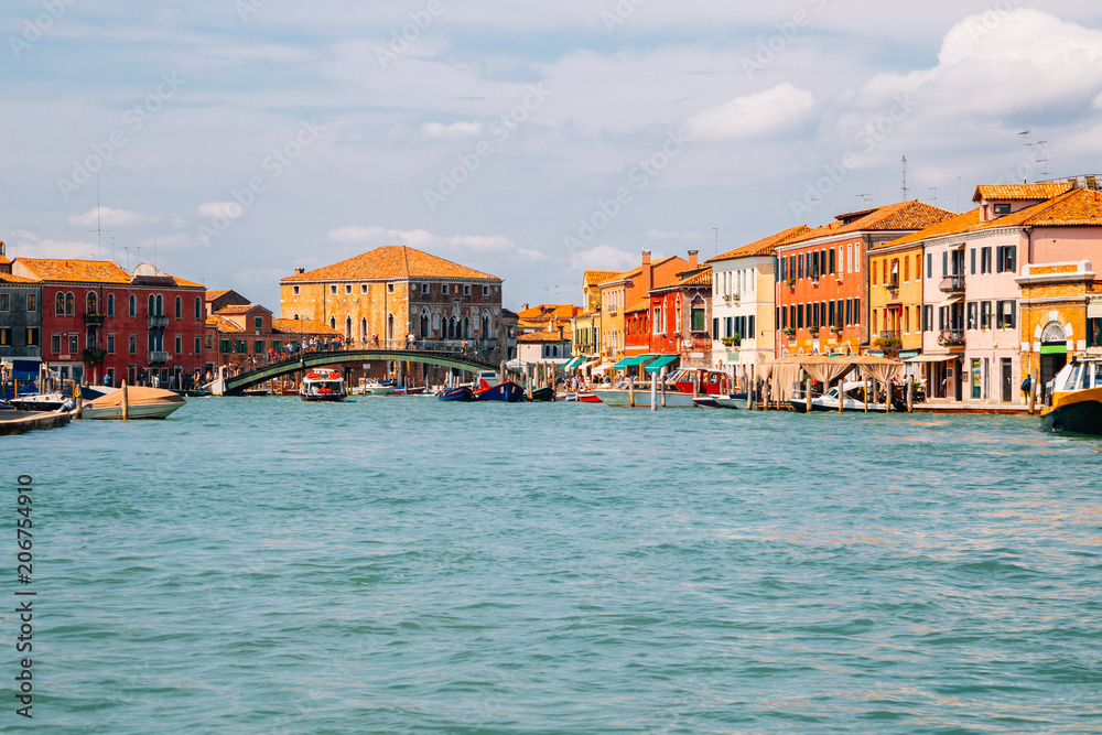 Colorful buildings and canal in Murano island, Venice, Italy