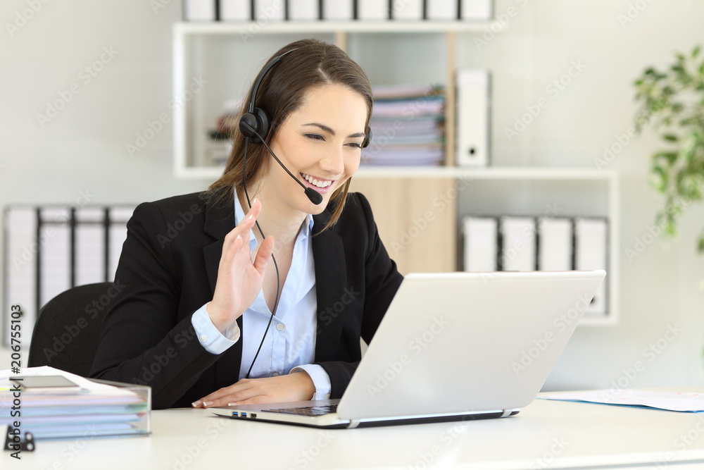 Telemarketer having a video conference at office Telemarketer having a video conference at office
