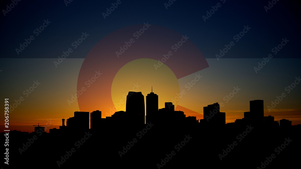 Denver Skyline Sunrise with Colorado Flag in Sky