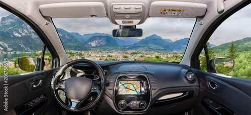 Car windshield view of Riva del Garda, Lake Garda, Italy