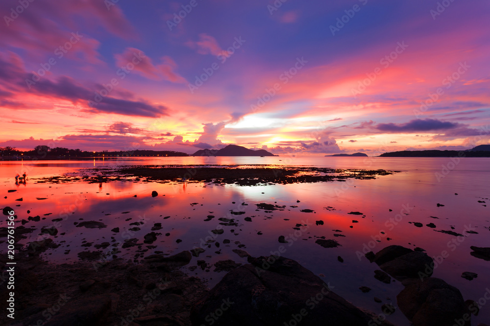 Beautiful scenery sunset or sunrise dramatic sky view of the sea and reflection in water.