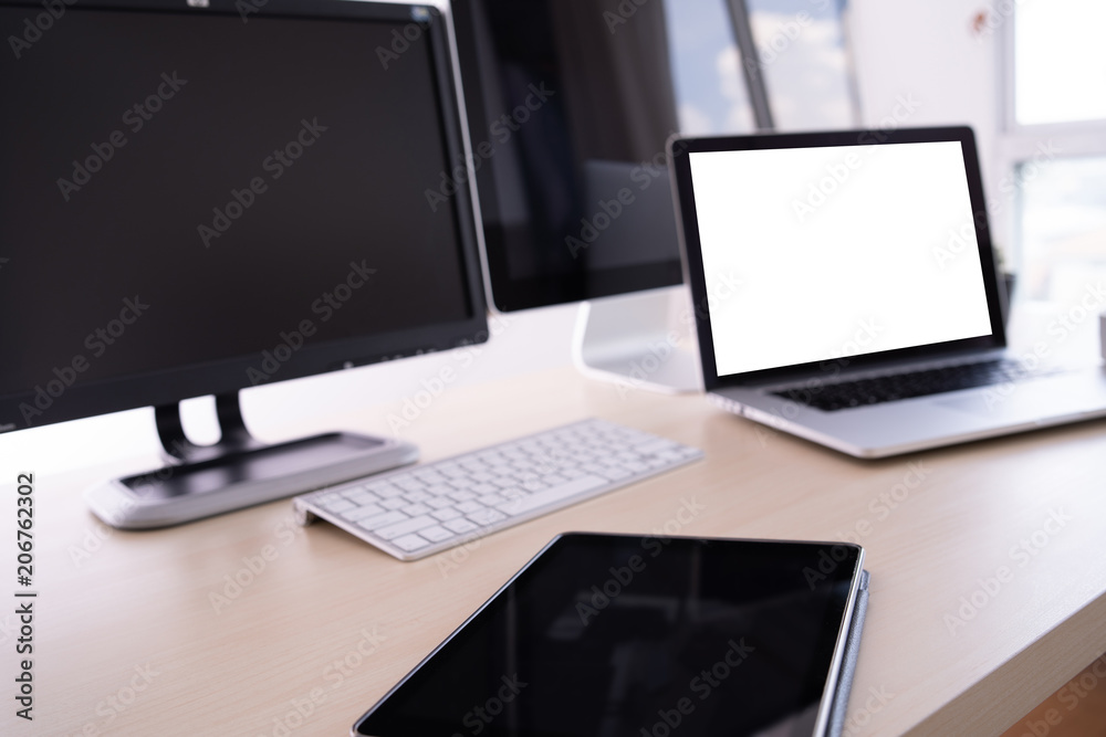 Laptop with blank screen on table. Workspace background new project on laptop computer with blank copy space screen for your advertising text message Laptop with blank screen on table. Workspace background new project on laptop computer with blank copy space screen for your advertising text message