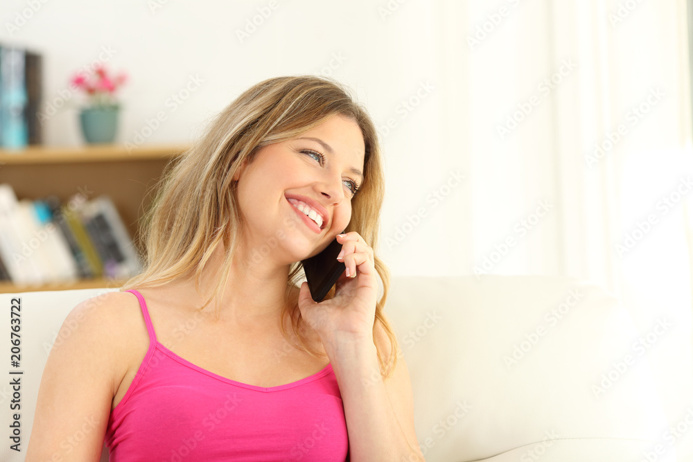 Candid girl talking during a phone call Candid girl talking during a phone call