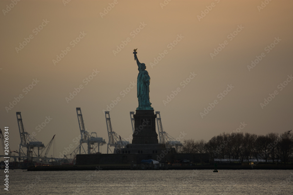 Statue of Liberty Against Orange Sky