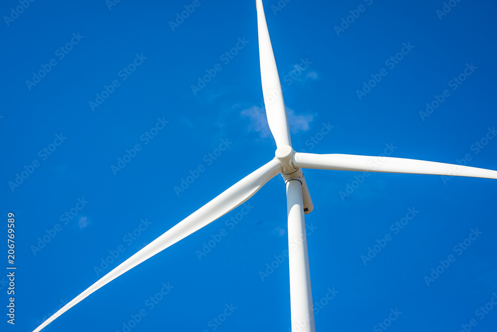Wind turbines generating electricity with blue sky Wind turbines generating electricity with blue sky