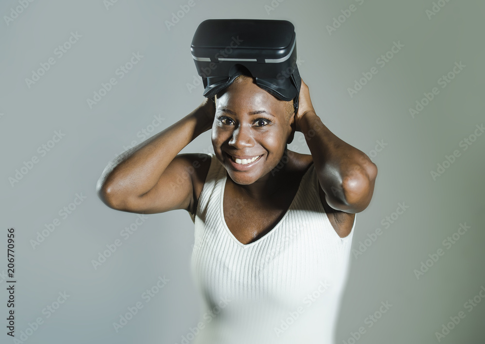 happy black afro american woman showing VR 3d vision goggles aft happy black afro american woman showing VR 3d vision goggles aft