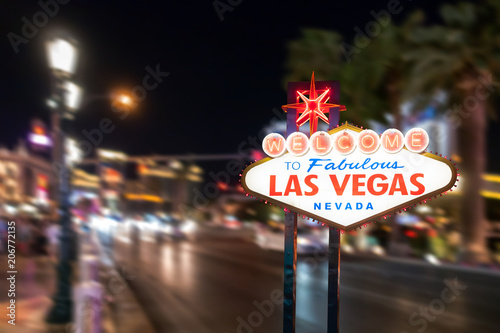 Famous Las Vegas sign with blur cityscape