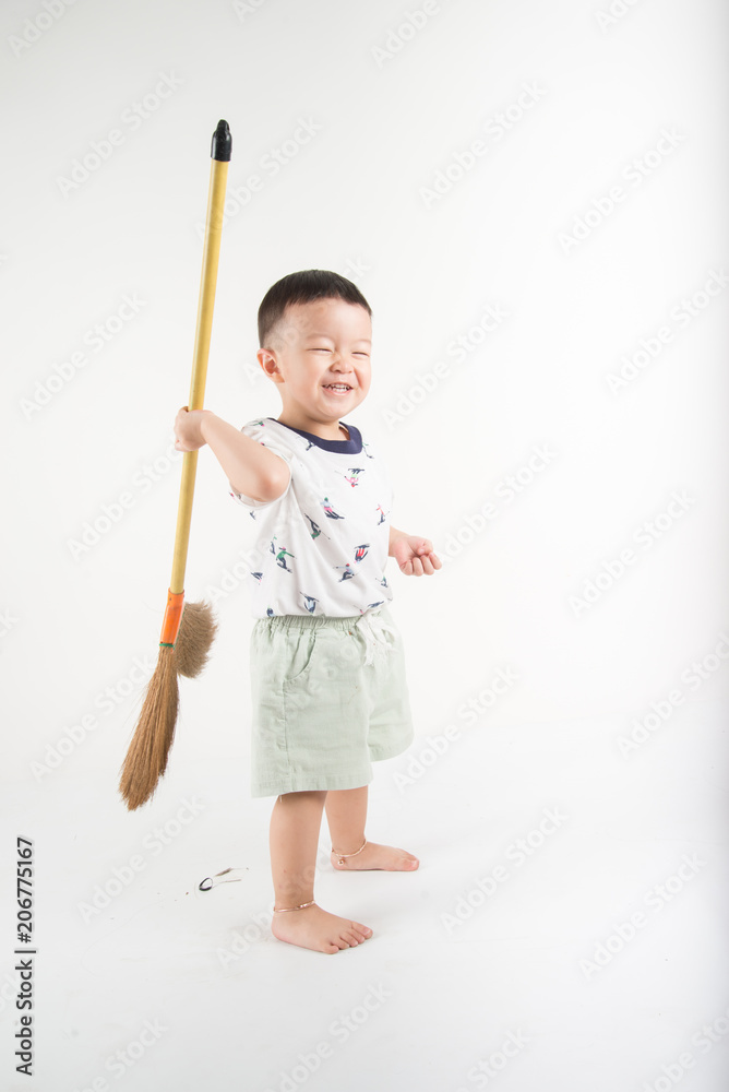 Happy toddler boy jumpping with smile face say Huray on white background Happy toddler boy jumpping with smile face say Huray on white background