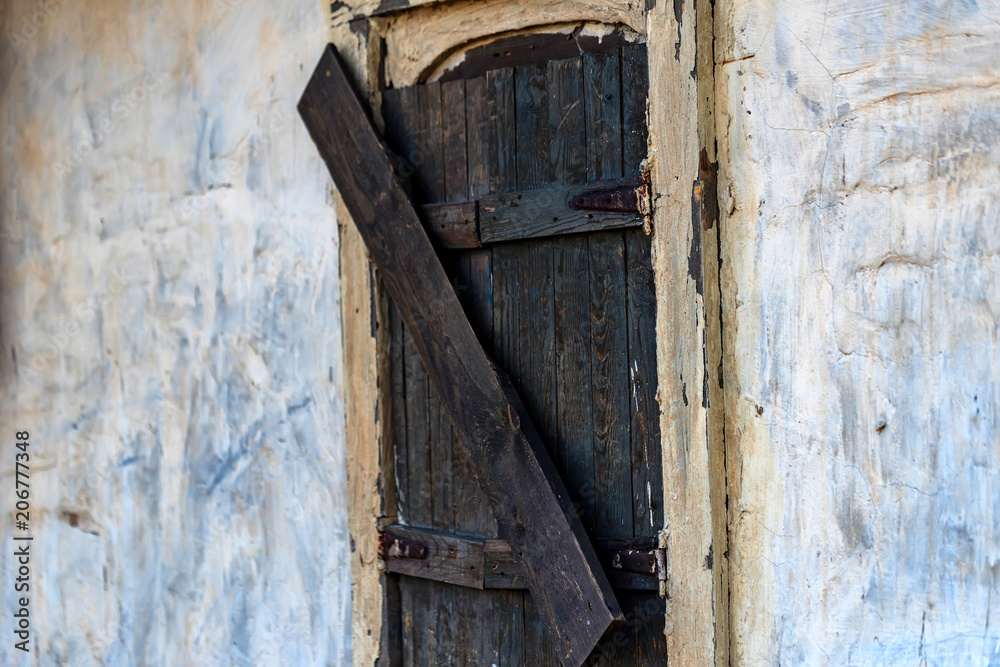 Old wooden window of abandoned buildig