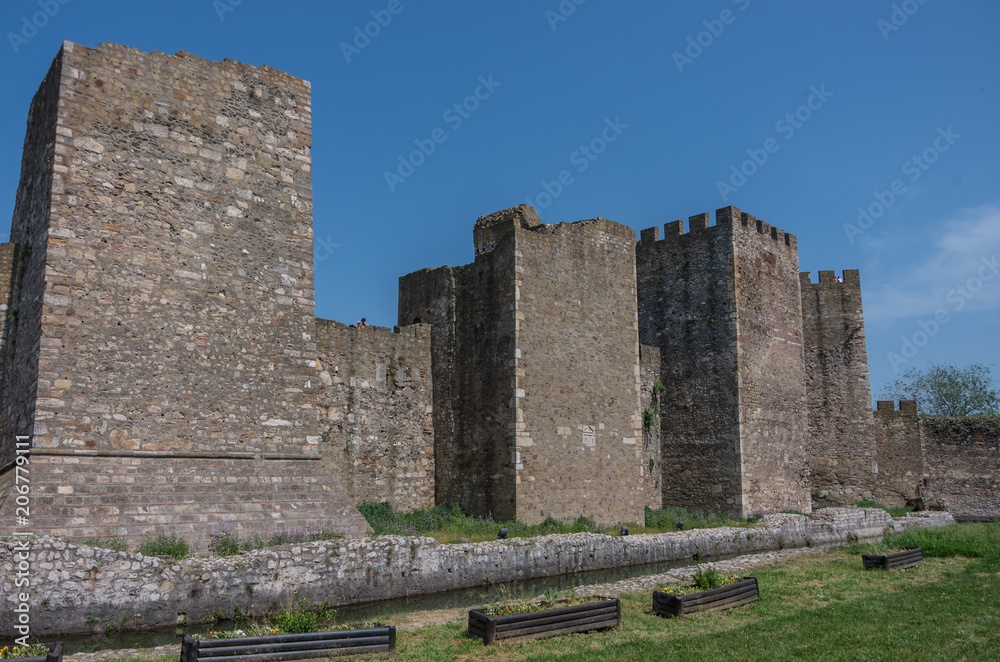 Wall, moat and towers of Smederevo Fortress is a medieval fortified city in Smederevo, Serbia, which was temporary capital of Serbia in the Middle Ages. Wall, moat and towers of Smederevo Fortress is a medieval fortified city in Smederevo, Serbia, which was temporary capital of Serbia in the Middle Ages.