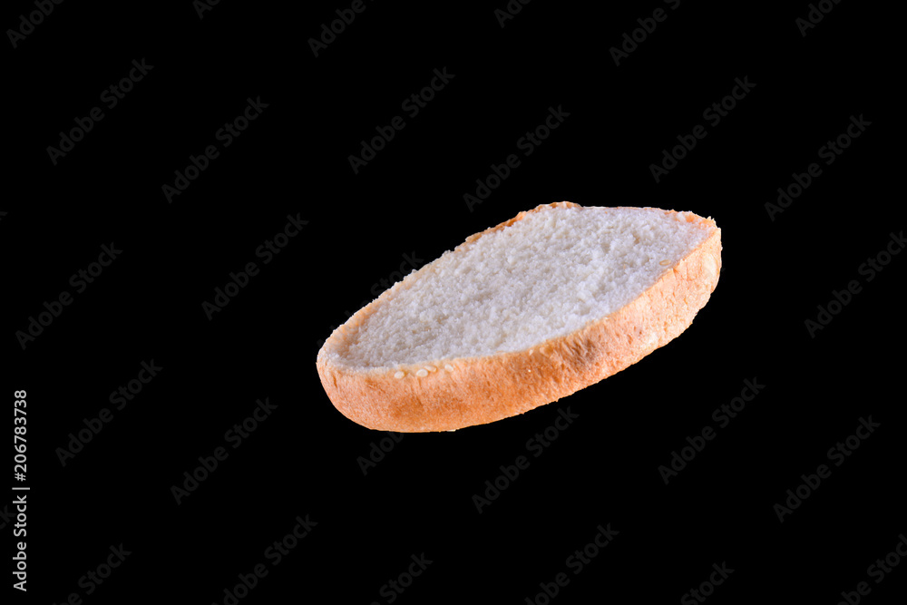Grilled burger bun isolated on black background. Close up Grilled burger bun isolated on black background. Close up