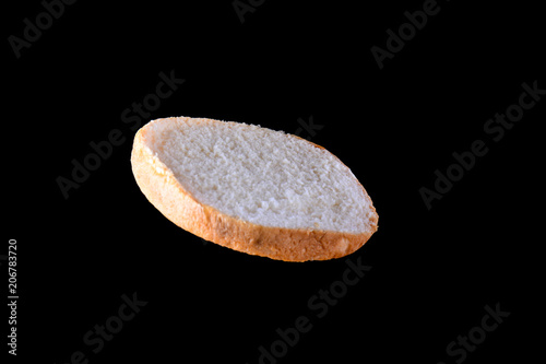 Grilled burger bun isolated on white background. Close up