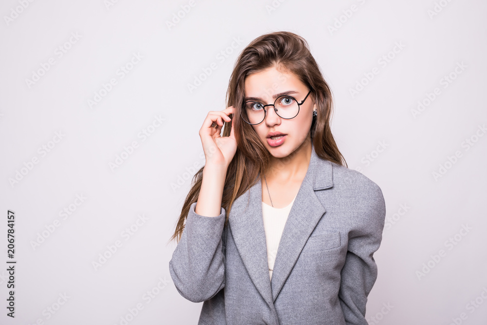 Portrait of a beautiful young woman wearing glasses isolated on white Portrait of a beautiful young woman wearing glasses isolated on white
