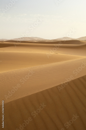 above sand dunes in desert in Morocco