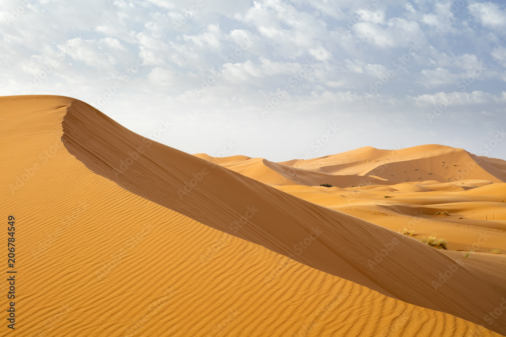 Naklejka premium orange hill of dune in Sahara desert in Morocco