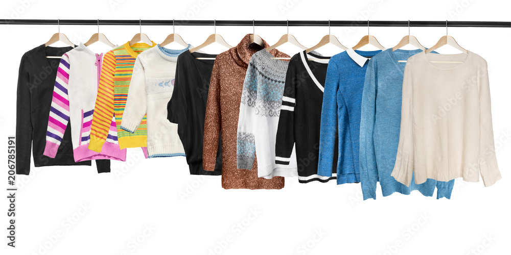 Hanging sweaters isolated