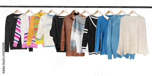 Hanging sweaters isolated