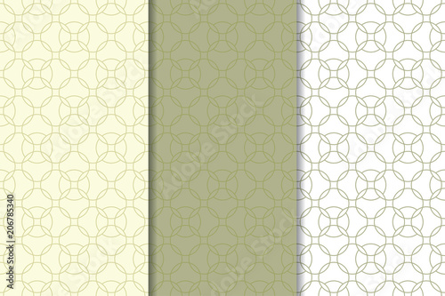 Olive green and white geometric ornaments. Set of seamless patterns