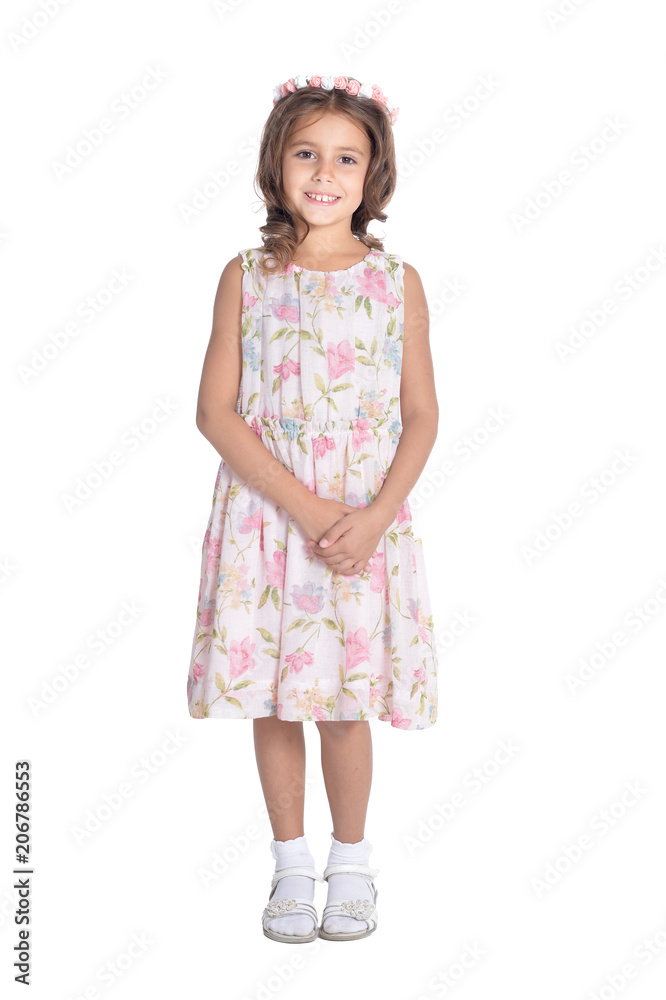 Happy little girl pointing up with finger isolated Happy little girl pointing up with finger isolated