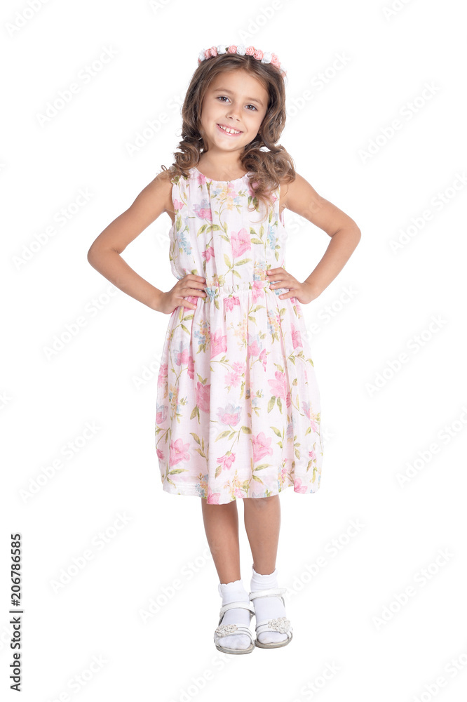 Happy little girl pointing up with finger isolated Happy little girl pointing up with finger isolated