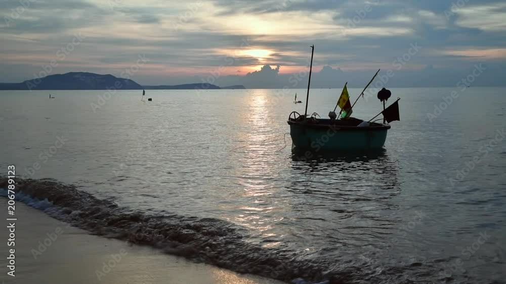 Local fishing boats in the sea with beautiful sky on morning at Phat Thiet, Mui Ne, Vietnam Local fishing boats in the sea with beautiful sky on morning at Phat Thiet, Mui Ne, Vietnam