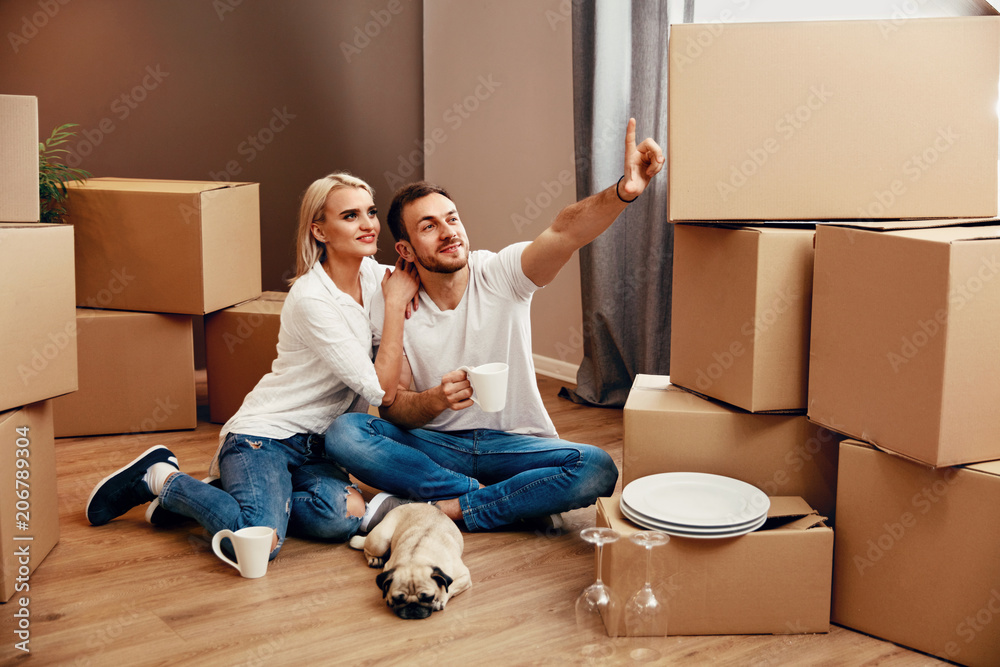 Young Couple Planning Moving In New Apartment Young Couple Planning Moving In New Apartment