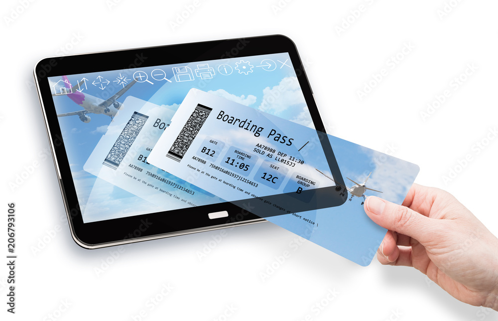 Online booking with hand of a woman taking an airplane ticket from a digital tablet. Online booking with hand of a woman taking an airplane ticket from a digital tablet.