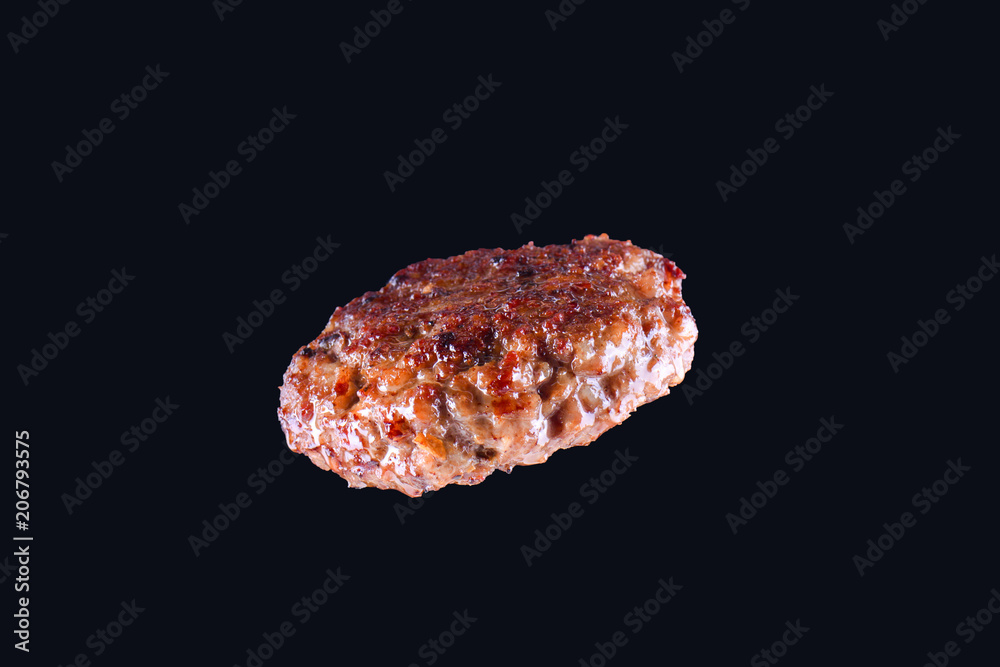 Fried fresh large beef burger isolated on white background. Grilled burger cutlet isolated on black Fried fresh large beef burger isolated on white background. Grilled burger cutlet isolated on black