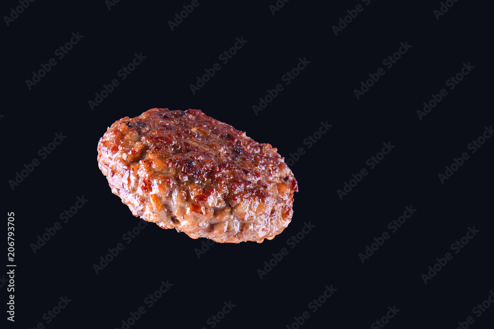 Fried fresh large beef burger isolated on white background. Grilled burger cutlet isolated on black Fried fresh large beef burger isolated on white background. Grilled burger cutlet isolated on black