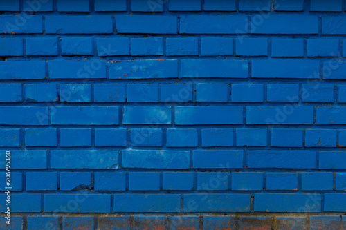 Blue brick wall  weathered and rough