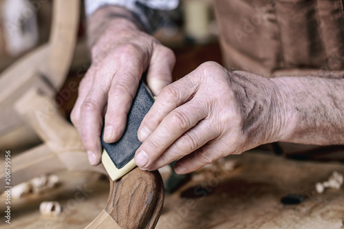 carpenter hands sanding