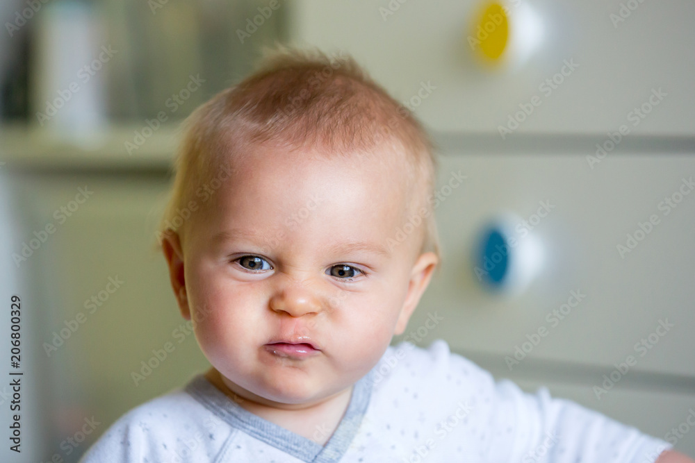 Image of sweet baby boy, closeup portrait of child, cute toddler with blue eyes Image of sweet baby boy, closeup portrait of child, cute toddler with blue eyes
